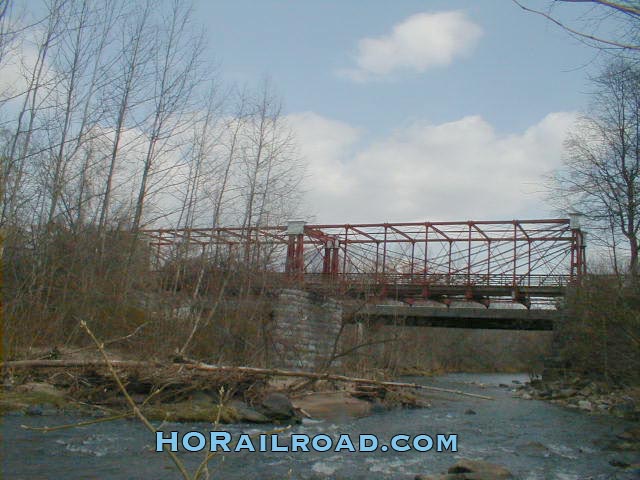 up river view of historic bridge